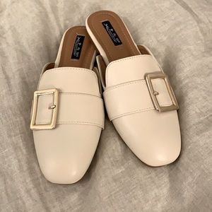 Nude belted slides